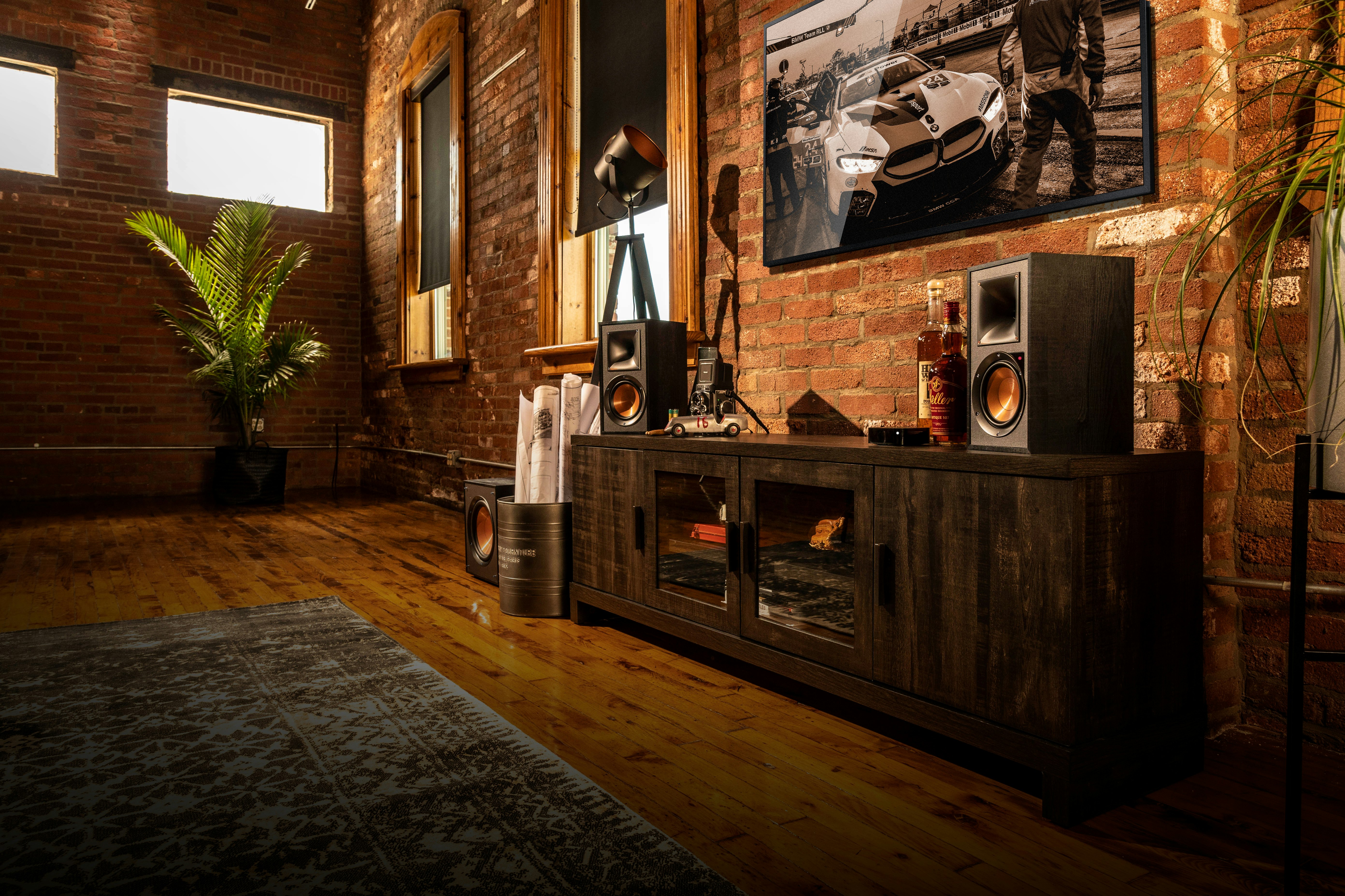 Klipsch Reference Powered Speakers on a wooden cabinet